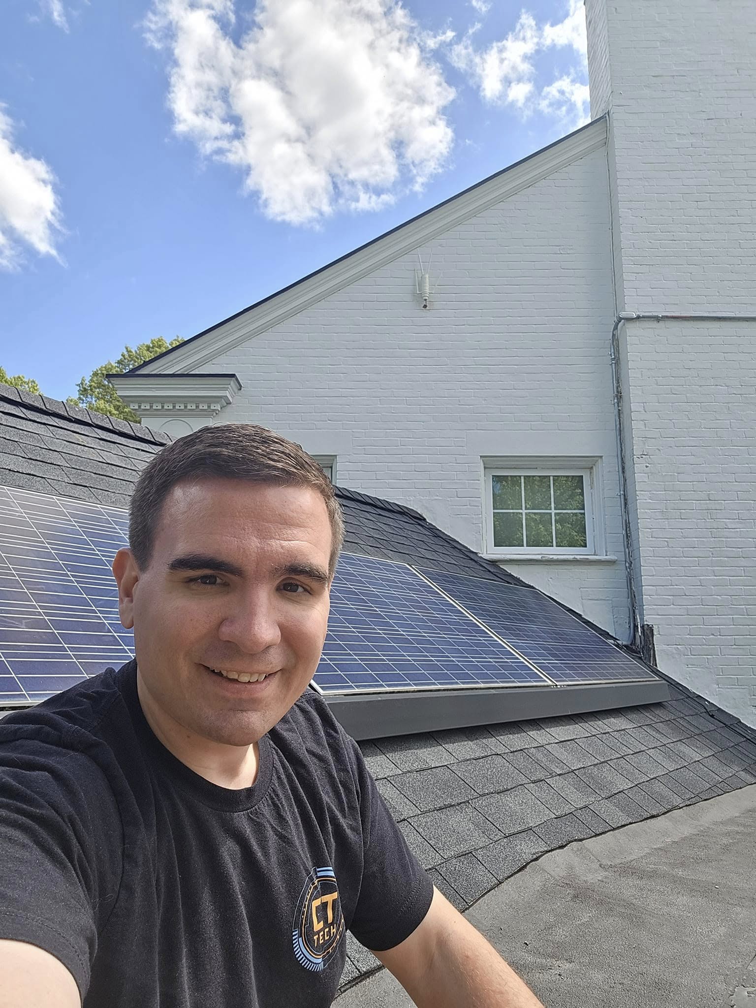 Matt Malecot, Owner of CT Tech Express, working on solar panel installation